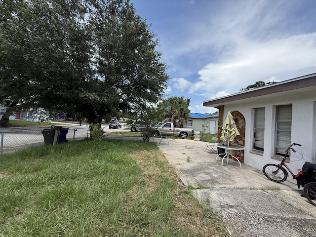 13097 120th St, Largo, FL 33778 - view of yard with a patio
