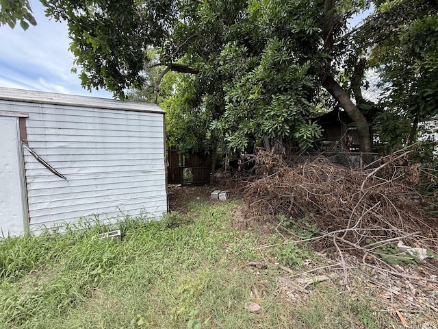 13097 120th St, Largo, FL 33778 - view of yard featuring a storage shed
