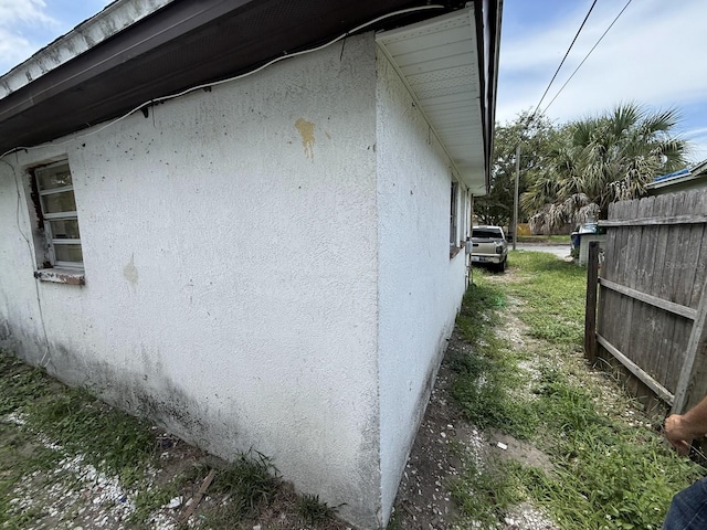 13097 120th St, Largo, FL 33778 - view of home's exterior featuring stucco siding