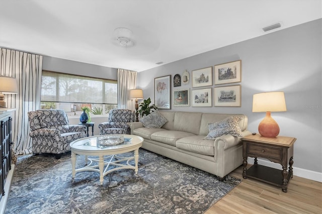 2009 Woodward Ave, Dunedin, FL 34698 - living room with wood finished floors and baseboards