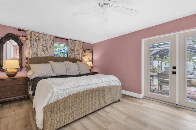 2009 Woodward Ave, Dunedin, FL 34698 - bedroom with access to exterior, wood finished floors, and ceiling fan