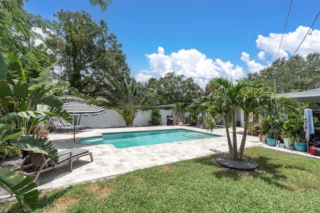 2009 Woodward Ave, Dunedin, FL 34698 - outdoor pool with a patio and a fenced backyard
