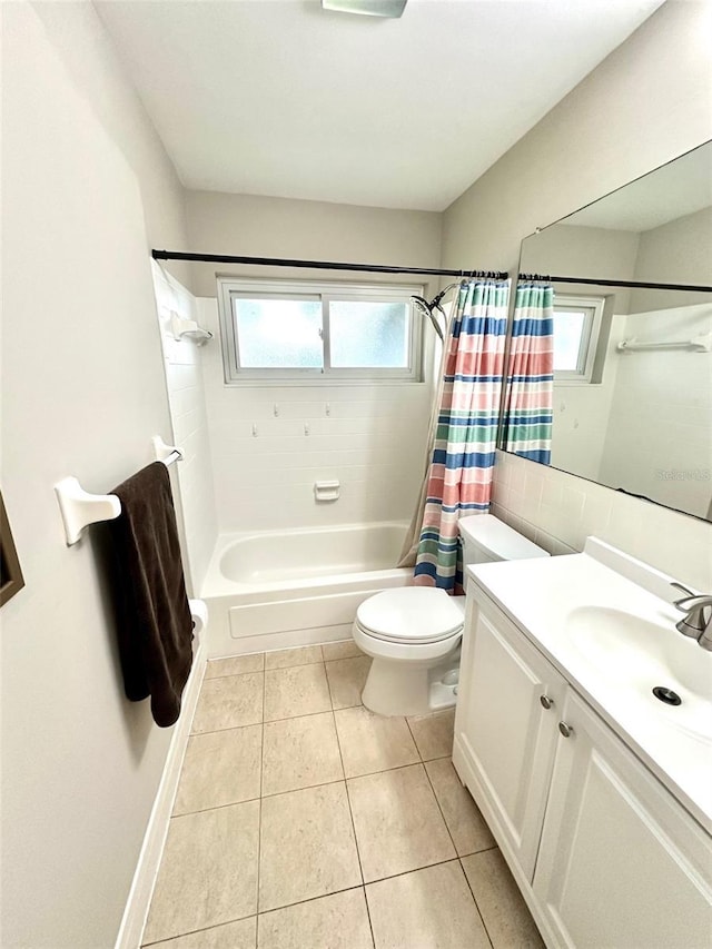 9830 44th Way N, Pinellas Park, FL 33782 - full bathroom featuring shower / bath combo, vanity, plenty of natural light, and tile patterned flooring