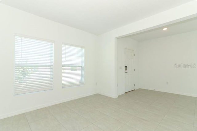 2555 Driftwood St, Auburndale, FL 33823 - empty room with baseboards and recessed lighting