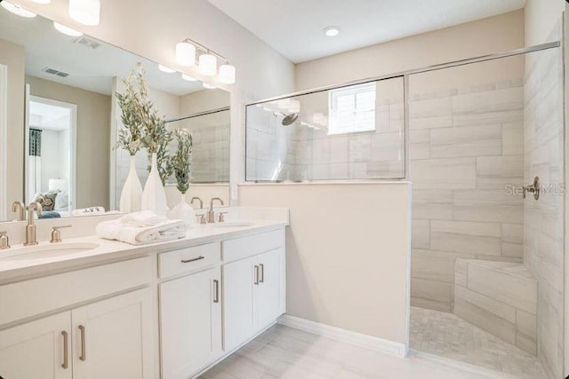 2257 Cypress Creek St, Auburndale, FL 33823 - full bath featuring ensuite bath, double vanity, and a walk in shower