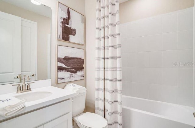 2257 Cypress Creek St, Auburndale, FL 33823 - bathroom featuring vanity and shower / bathtub combination with curtain