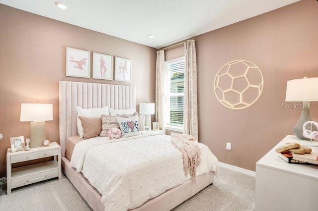 2257 Cypress Creek St, Auburndale, FL 33823 - bedroom with light carpet and baseboards
