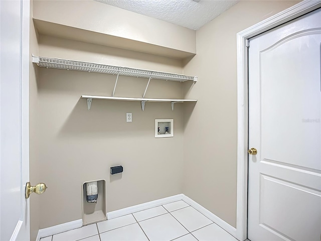 9803 Ocasta St, Riverview, FL 33569 - washroom with hookup for a washing machine, tile patterned flooring, and a textured ceiling