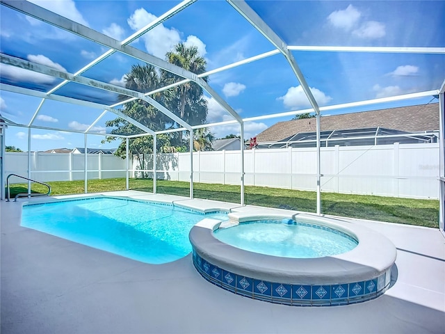 9803 Ocasta St, Riverview, FL 33569 - view of pool with a fenced backyard, a pool with connected hot tub, a lanai, and a patio