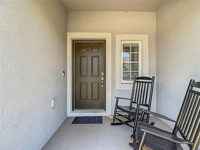 7133 Summer Holly Pl, Riverview, FL 33578 - property entrance with stucco siding