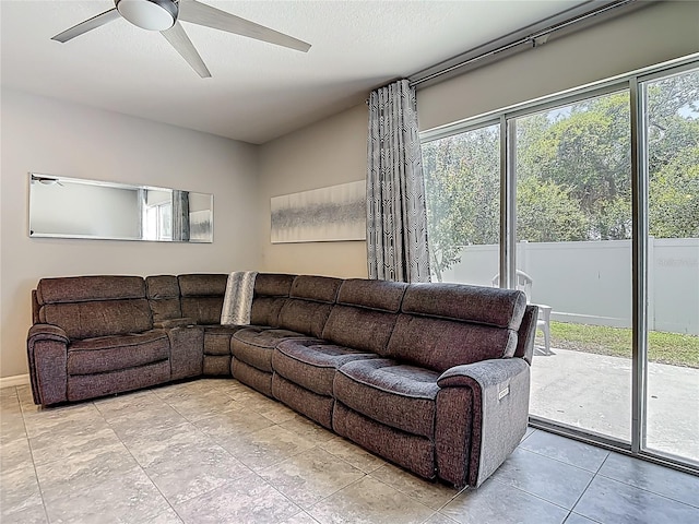 7133 Summer Holly Pl, Riverview, FL 33578 - living room featuring a ceiling fan and light tile patterned floors