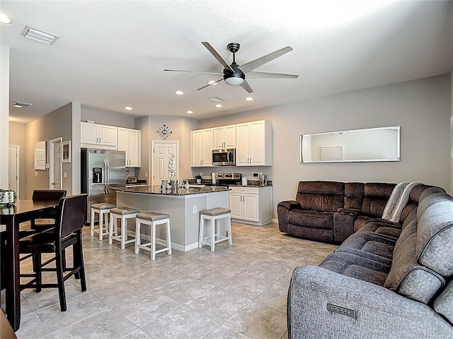 7133 Summer Holly Pl, Riverview, FL 33578 - living room with ceiling fan and recessed lighting