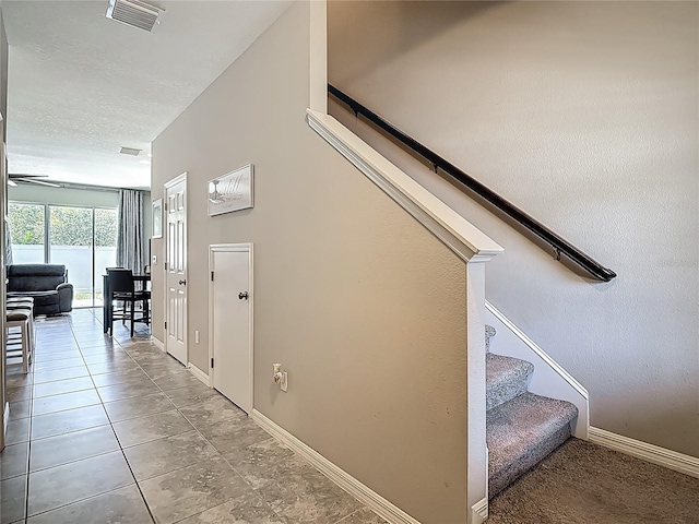 7133 Summer Holly Pl, Riverview, FL 33578 - staircase with baseboards and tile patterned flooring