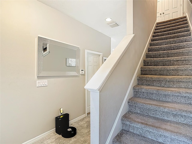 7133 Summer Holly Pl, Riverview, FL 33578 - staircase with baseboards