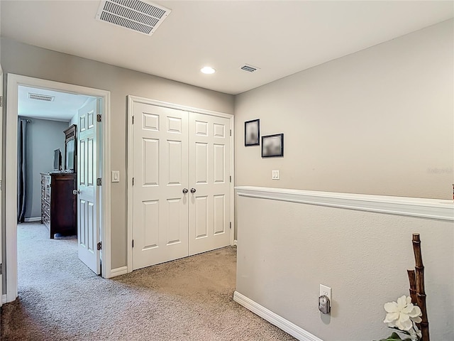 7133 Summer Holly Pl, Riverview, FL 33578 - corridor with light colored carpet and recessed lighting