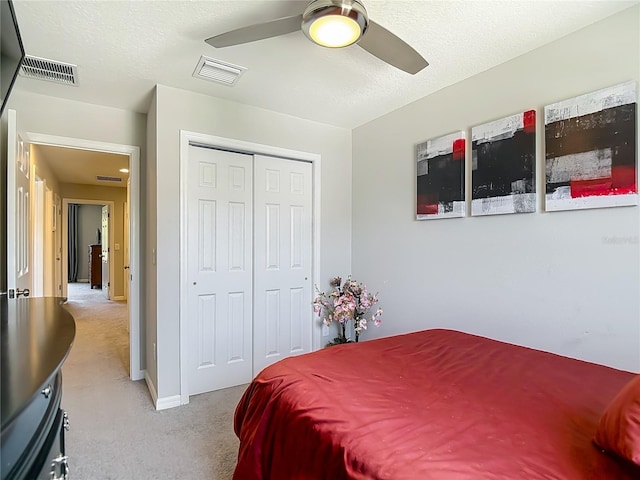 7133 Summer Holly Pl, Riverview, FL 33578 - bedroom featuring light colored carpet, a closet, and a ceiling fan