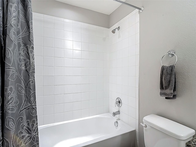 7133 Summer Holly Pl, Riverview, FL 33578 - bathroom featuring shower / bath combination with curtain and a textured wall