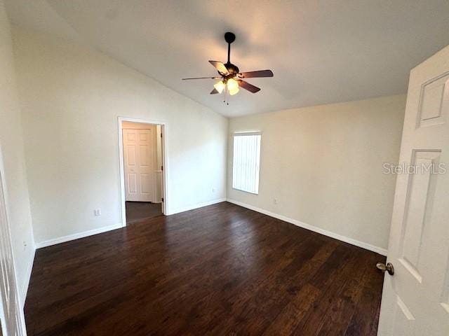 24838 Oakhaven Ct, Lutz, FL 33559 - unfurnished room featuring a ceiling fan, dark wood-style flooring, and vaulted ceiling