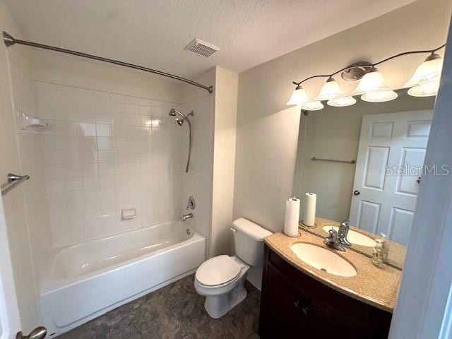 24838 Oakhaven Ct, Lutz, FL 33559 - bathroom featuring vanity, bathtub / shower combination, and a textured ceiling