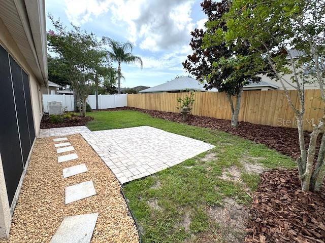 24838 Oakhaven Ct, Lutz, FL 33559 - fenced backyard with a patio