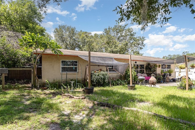 4530 David Dr, Bartow, FL 33830 - back of house with stucco siding