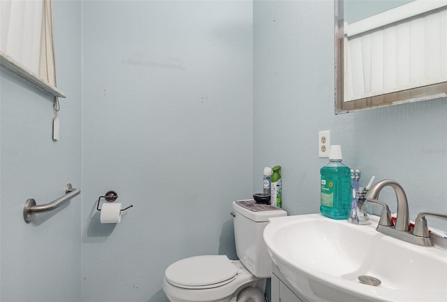 4530 David Dr, Bartow, FL 33830 - half bathroom featuring toilet and vanity