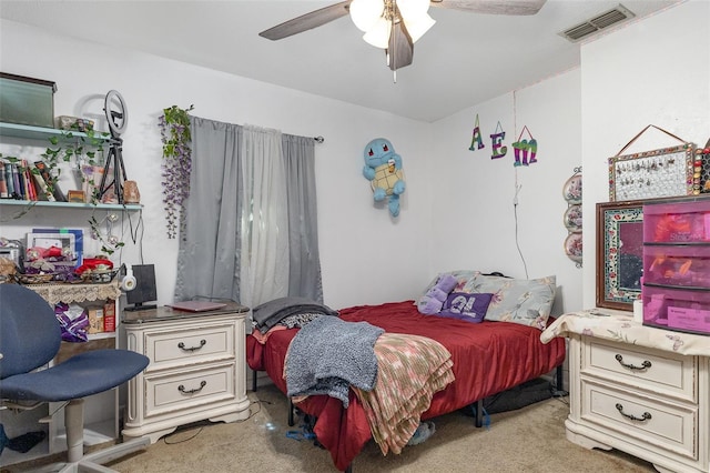 4530 David Dr, Bartow, FL 33830 - carpeted bedroom with a ceiling fan