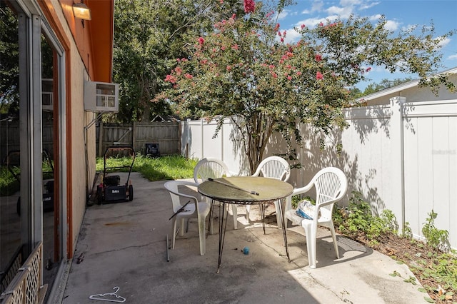 4530 David Dr, Bartow, FL 33830 - fenced backyard with a patio and outdoor dining area