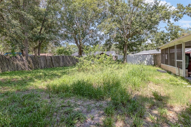 4530 David Dr, Bartow, FL 33830 - view of yard featuring a sunroom