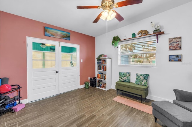 360 71st Ave, St Pete Beach, FL 33706 - sitting room featuring plenty of natural light, wood finished floors, and a ceiling fan