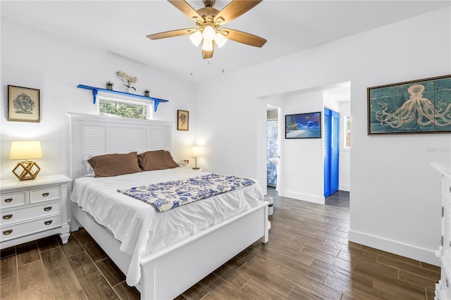 360 71st Ave, St Pete Beach, FL 33706 - bedroom with dark wood-style floors and a ceiling fan