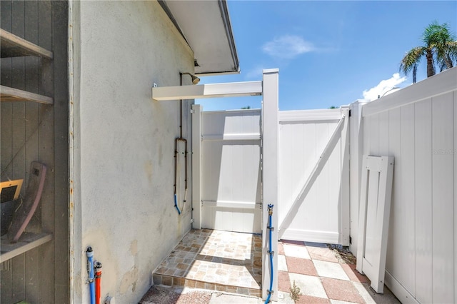 360 71st Ave, St Pete Beach, FL 33706 - view of patio with a gate