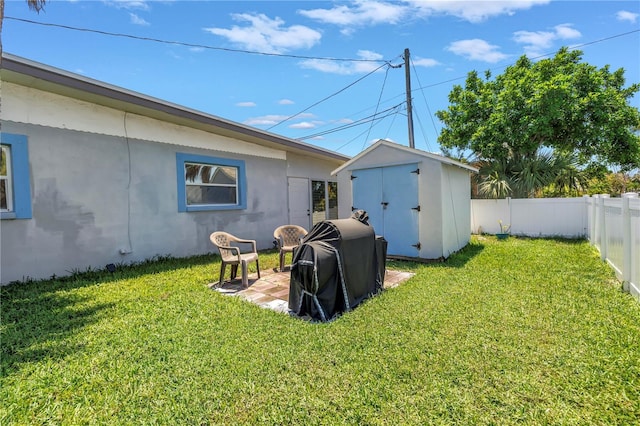 360 71st Ave, St Pete Beach, FL 33706 - fenced backyard featuring a storage unit
