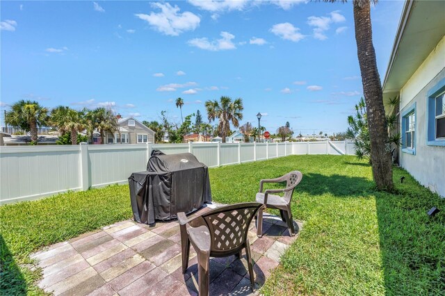 360 71st Ave, St Pete Beach, FL 33706 - fenced backyard featuring a patio