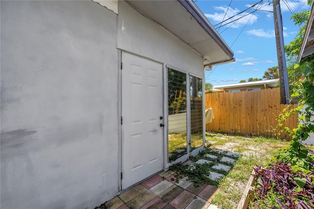 360 71st Ave, St Pete Beach, FL 33706 - entrance to property featuring stucco siding