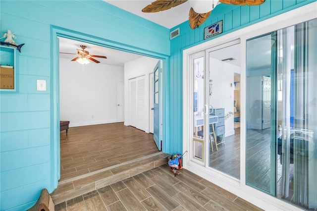 360 71st Ave, St Pete Beach, FL 33706 - foyer entrance featuring a ceiling fan and wood finished floors