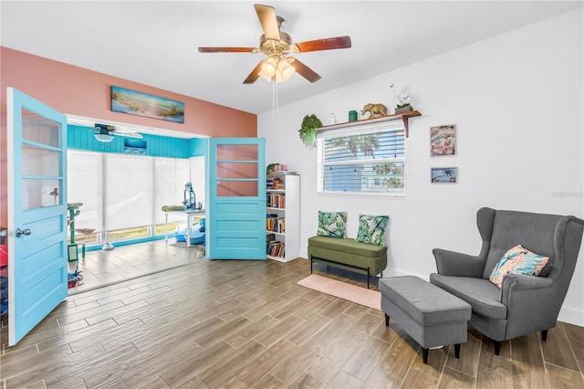 360 71st Ave, St Pete Beach, FL 33706 - sitting room featuring a ceiling fan and wood finished floors