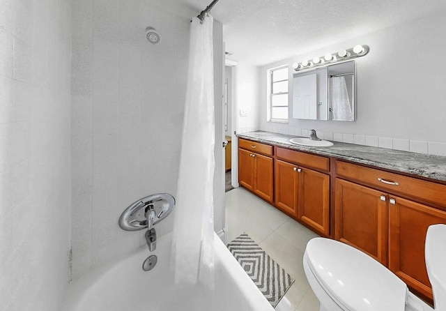 1146 King Arthur Ct Unit 114, Dunedin, FL 34698 - full bath featuring vanity, shower / bathtub combination with curtain, and tile patterned floors