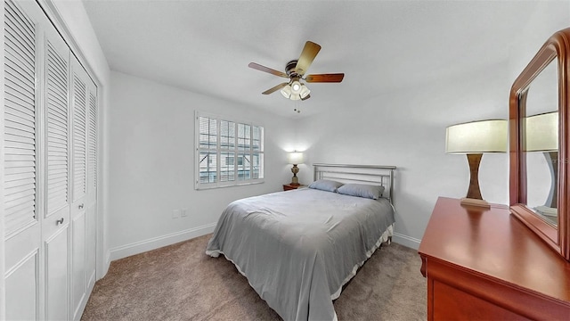 1146 King Arthur Ct Unit 114, Dunedin, FL 34698 - bedroom with carpet floors, a closet, and a ceiling fan