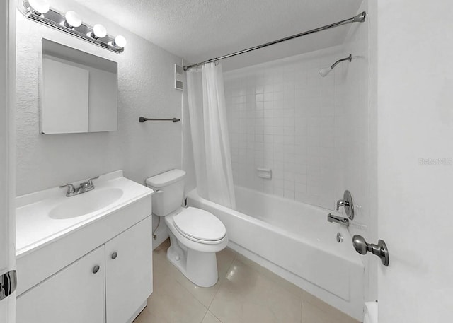 1146 King Arthur Ct Unit 114, Dunedin, FL 34698 - full bath featuring shower / bath combination with curtain, vanity, a textured ceiling, and tile patterned flooring