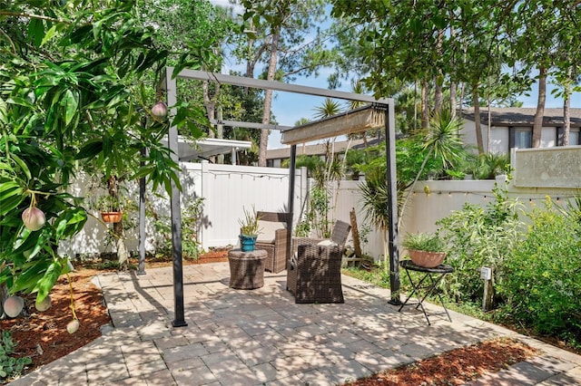 view of patio / terrace featuring a pergola