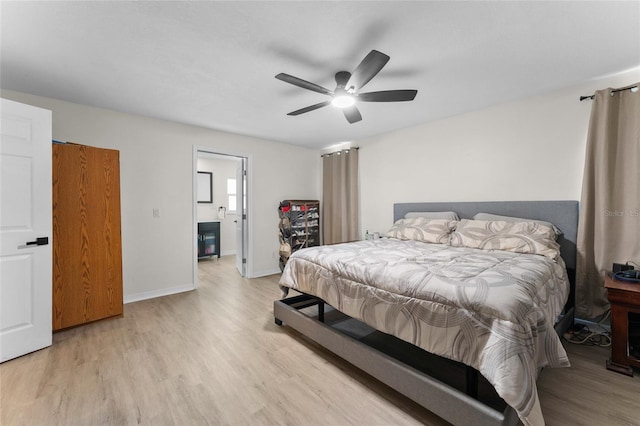 bedroom featuring wood finished floors and ceiling fan