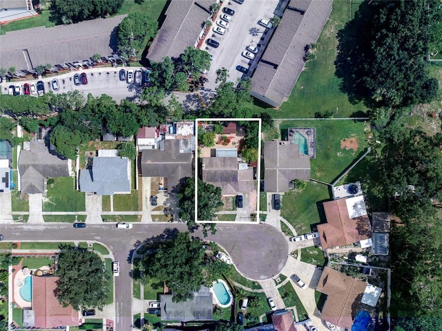view of property location featuring property parcel outlined and nearby suburban area
