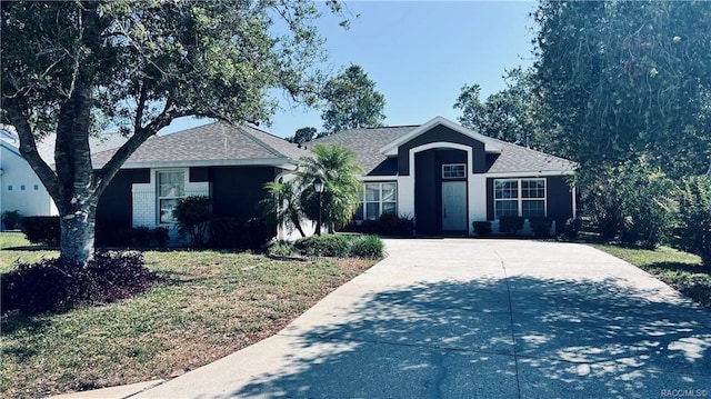 4175 N Stewart Way, Beverly Hills, FL 34465 - single story home with driveway and a front lawn