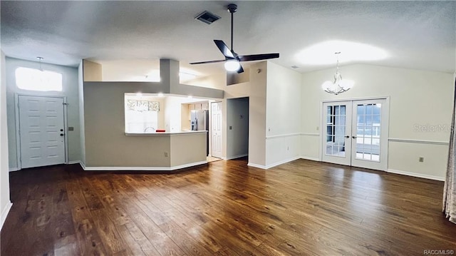 4175 N Stewart Way, Beverly Hills, FL 34465 - unfurnished living room featuring vaulted ceiling, wood-type flooring, ceiling fan, a chandelier, and french doors