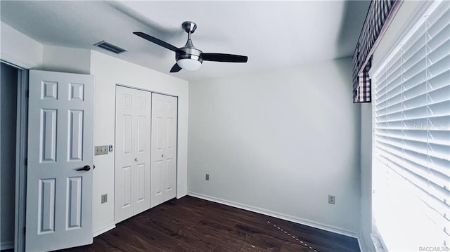 4175 N Stewart Way, Beverly Hills, FL 34465 - unfurnished bedroom with dark wood finished floors, a closet, and ceiling fan