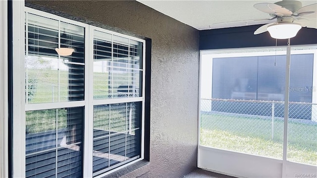 4175 N Stewart Way, Beverly Hills, FL 34465 - doorway to property with stucco siding and ceiling fan
