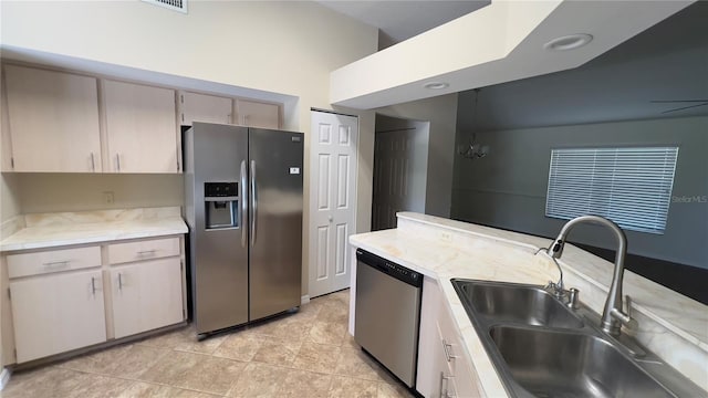 4175 N Stewart Way, Beverly Hills, FL 34465 - kitchen featuring appliances with stainless steel finishes, light countertops, and light tile patterned floors