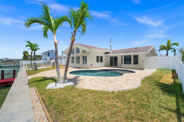 600 115th Ave, Treasure Island, FL 33706 - view of swimming pool with a fenced backyard, a patio area, and a gate