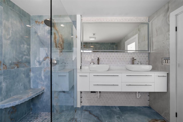 600 115th Ave, Treasure Island, FL 33706 - full bath with walk in shower, double vanity, and tile walls